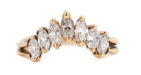Curved Band of 7 Marquise cut Diamonds in 14 Karat Yellow Gold